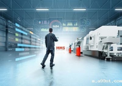 Operator on shop floor with stand alone machine tools Operator on shop floor with stand alone machine tools